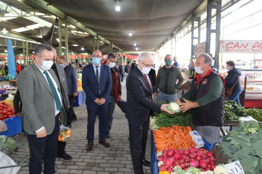 “DEVECİLER’DEN PAZAR ESNAFINA ZİYARET”