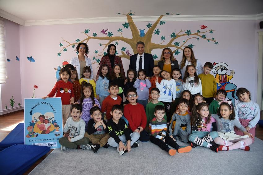 “BIR MASAL ANLATMAYLA GERI ALDIM ÇOCUKLUĞUMU”